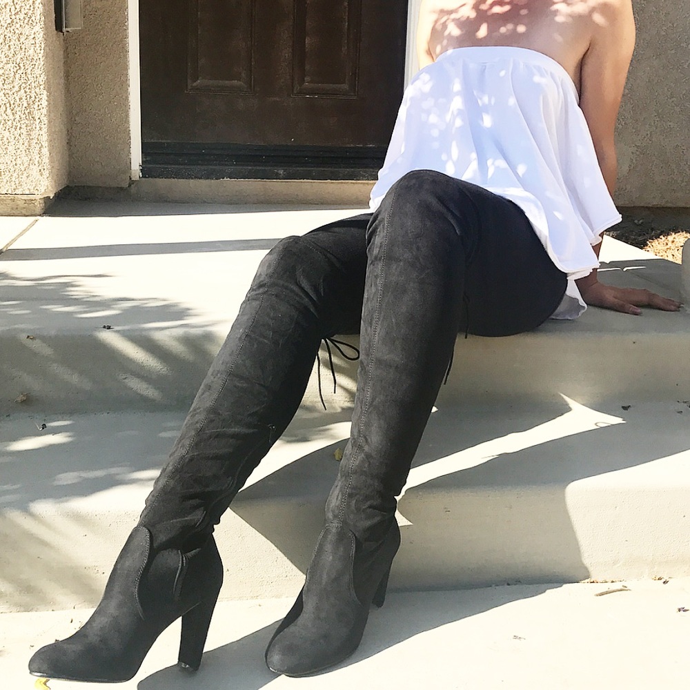 Black thigh high boots